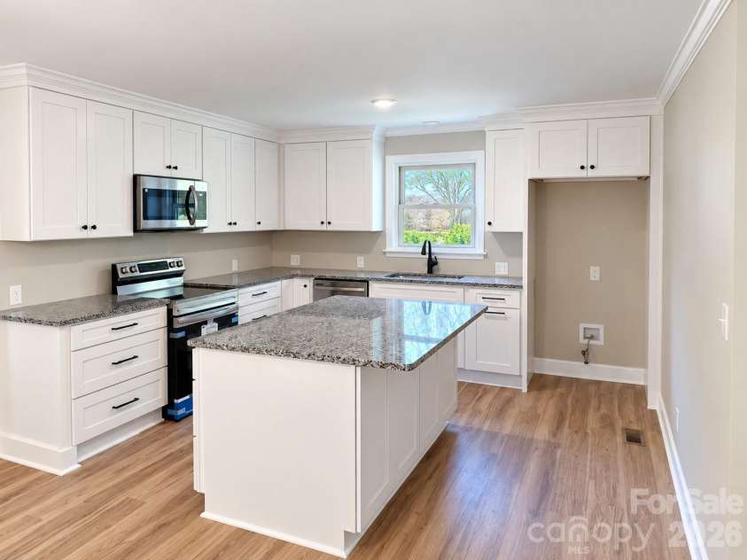 506 Elm Street, Norwood, NC 28128.  MLS# CAR4422927, YatesRealty ID 49718. Remodeled kitchen
