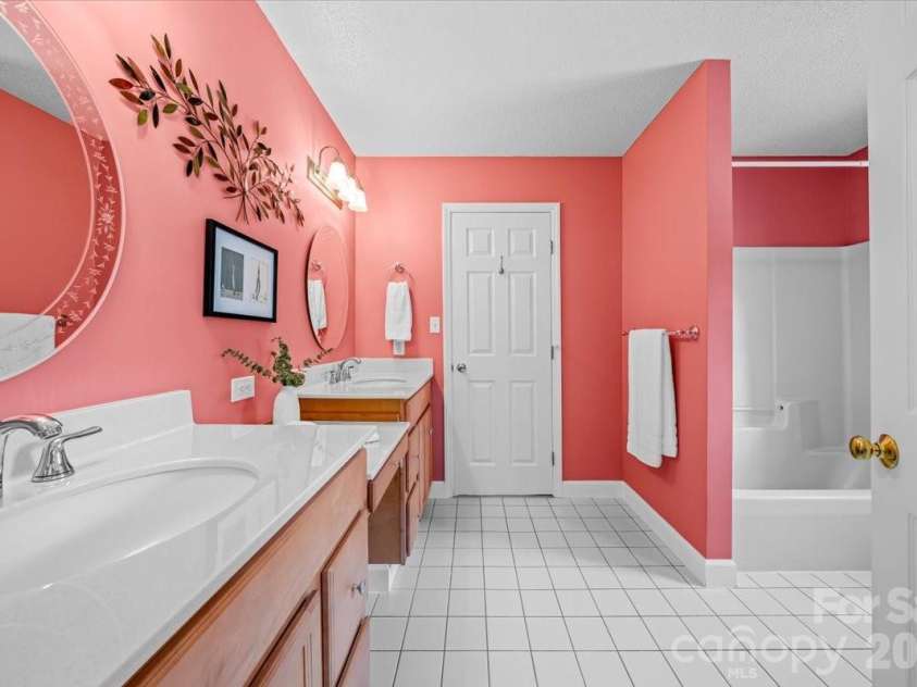 16601 Jefferson Place, Fort Mill, SC 29708.  MLS# CAR4351321, YatesRealty ID 4972. Bathroom connecting First and Second Bedrooms