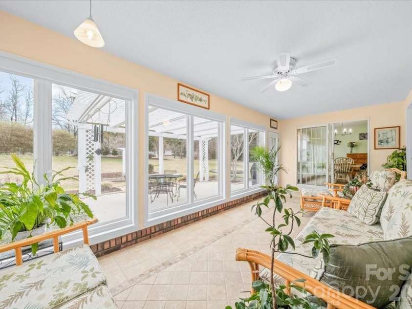 16601 Jefferson Place, Fort Mill, SC 29708.  MLS# CAR4351321, YatesRealty ID 4972. Sunroom