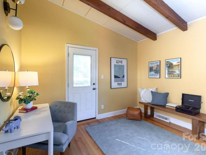 1526 Briarfield Drive, Charlotte, NC 28205.  MLS# CAR4422287, YatesRealty ID 49726. Bright, versatile space — office, playroom, or studio.