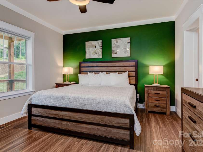 115 Cascade Ridge Road, Fairview, NC 28730.  MLS# CAR4222933, YatesRealty ID 4973. Master Bedroom with walk in closet and en-suite