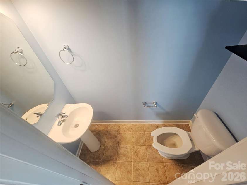 4657 Johnston Oehler Road, Charlotte, NC 28269.  MLS# CAR4422186, YatesRealty ID 49733. Guest Bathroom