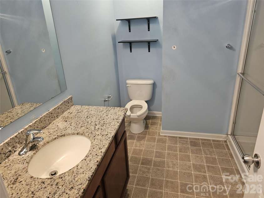 4657 Johnston Oehler Road, Charlotte, NC 28269.  MLS# CAR4422186, YatesRealty ID 49733. Primary Bathroom