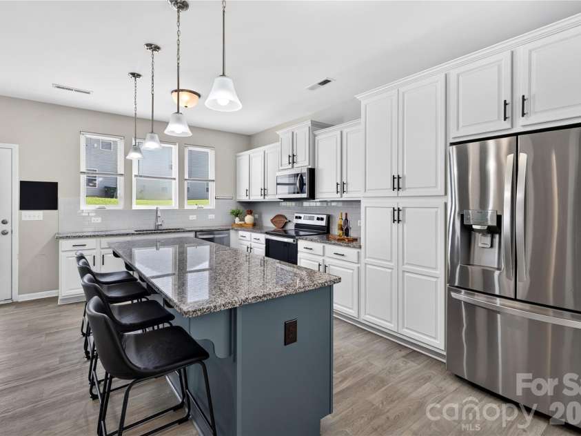 167 Sutters Mill Drive, Troutman, NC 28166.  MLS# CAR4422610, YatesRealty ID 49746. Kitchen