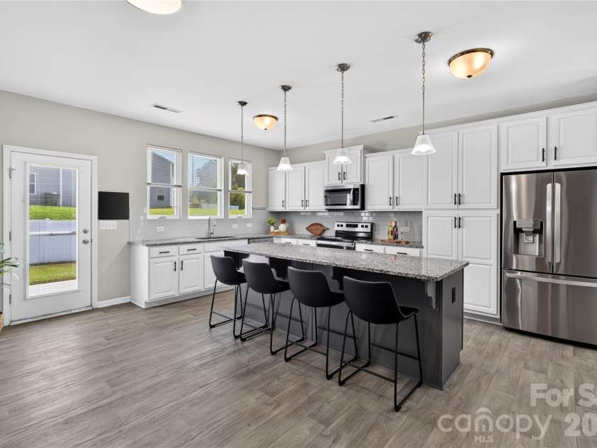 167 Sutters Mill Drive, Troutman, NC 28166.  MLS# CAR4422610, YatesRealty ID 49746. Kitchen