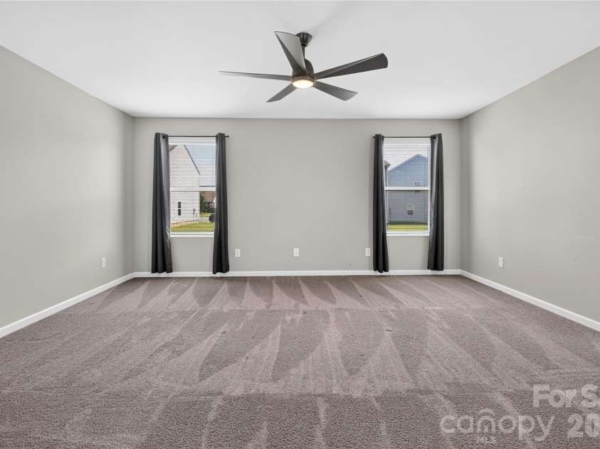 167 Sutters Mill Drive, Troutman, NC 28166.  MLS# CAR4422610, YatesRealty ID 49746. Primary Bedroom