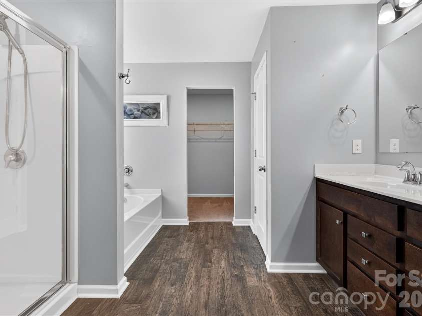167 Sutters Mill Drive, Troutman, NC 28166.  MLS# CAR4422610, YatesRealty ID 49746. Primary En suite