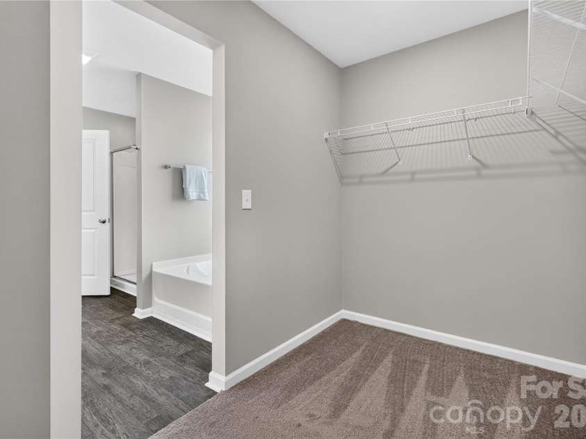 167 Sutters Mill Drive, Troutman, NC 28166.  MLS# CAR4422610, YatesRealty ID 49746. Primary Walk in Closet