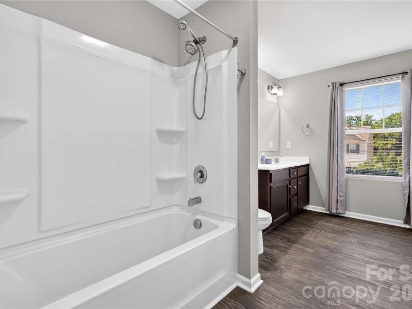 167 Sutters Mill Drive, Troutman, NC 28166.  MLS# CAR4422610, YatesRealty ID 49746. Upper Bathroom