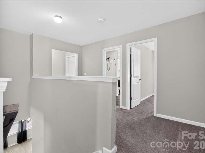 167 Sutters Mill Drive, Troutman, NC 28166.  MLS# CAR4422610, YatesRealty ID 49746. Upper Level Hall