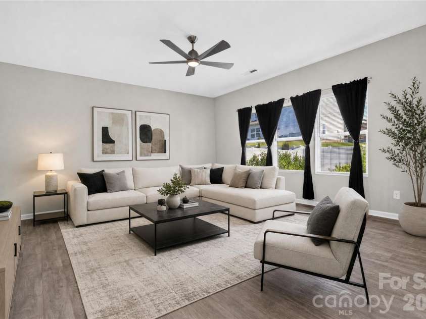 167 Sutters Mill Drive, Troutman, NC 28166.  MLS# CAR4422610, YatesRealty ID 49746. Virtually Staged Living