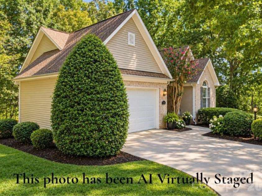 14724 Beatties Ford Road, Huntersville, NC 28078.  MLS# CAR4422428, YatesRealty ID 49748. Virtually staged front of home