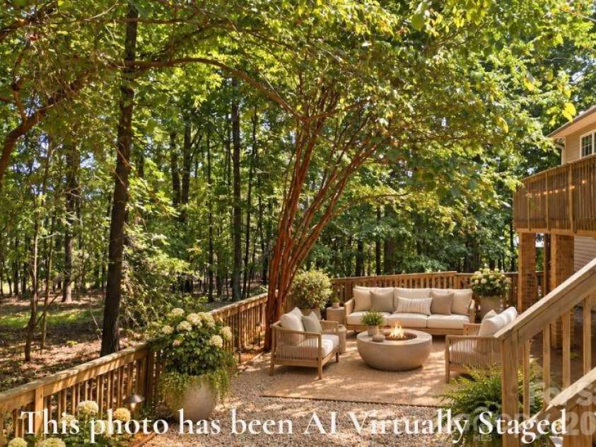 14724 Beatties Ford Road, Huntersville, NC 28078.  MLS# CAR4422428, YatesRealty ID 49748. Virtually staged small fenced backyard for entertaining.