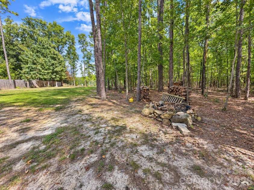 9201 Providence Road, Waxhaw, NC 28173.  MLS# CAR4422209, YatesRealty ID 49757. Firepit area