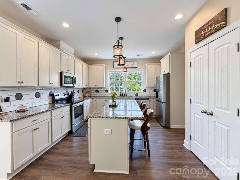 9201 Providence Road, Waxhaw, NC 28173.  MLS# CAR4422209, YatesRealty ID 49757. Island offers extra counter space and seating