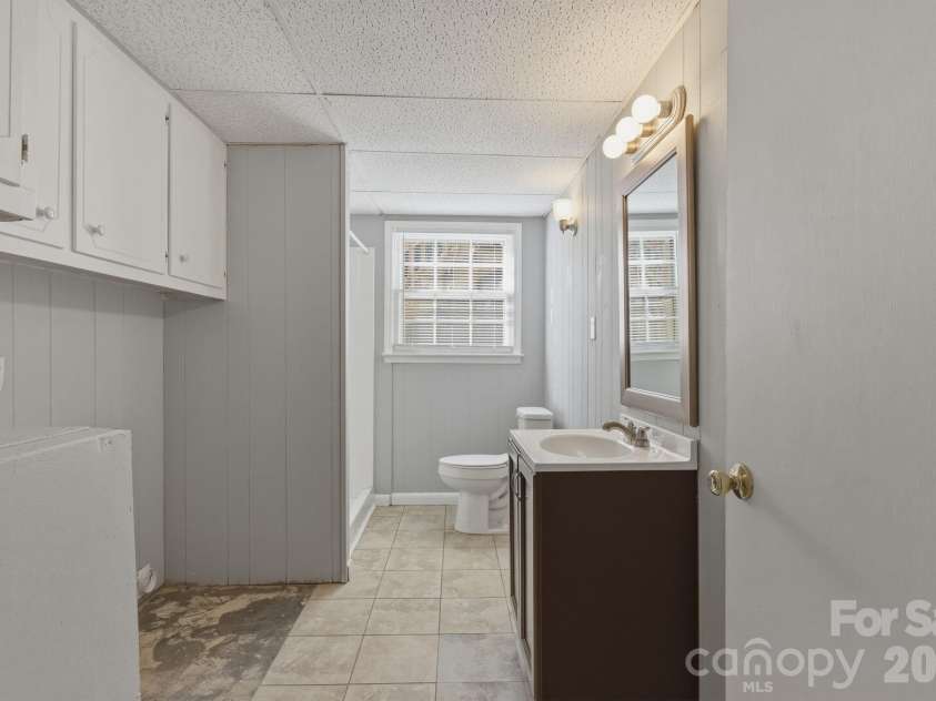 1230 18th Avenue, Hickory, NC 28601.  MLS# CAR4335635, YatesRealty ID 4976. Laundry on Lower Level with Bathroom