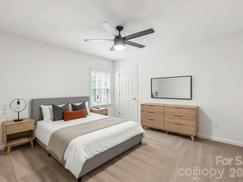 910 Beverly Drive, Rock Hill, SC 29730.  MLS# CAR4421788, YatesRealty ID 49769. A comfortably sized second bedroom featuring fresh paint and plenty of closet space...ideal for family and guest. Virtually Staged