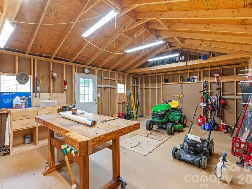910 Beverly Drive, Rock Hill, SC 29730.  MLS# CAR4421788, YatesRealty ID 49769. With no HOA rules, a spacious powered workshop, and a flexible floor plan, the options are endless for hobbies, extra storage, home business needs, or outdoor living.