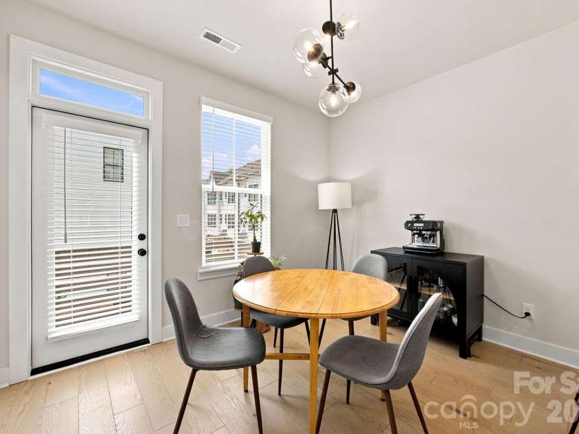 2303 Rozzelles Ferry Road, Charlotte, NC 28208.  MLS# CAR4421557, YatesRealty ID 49772. Dining area with deck for grill