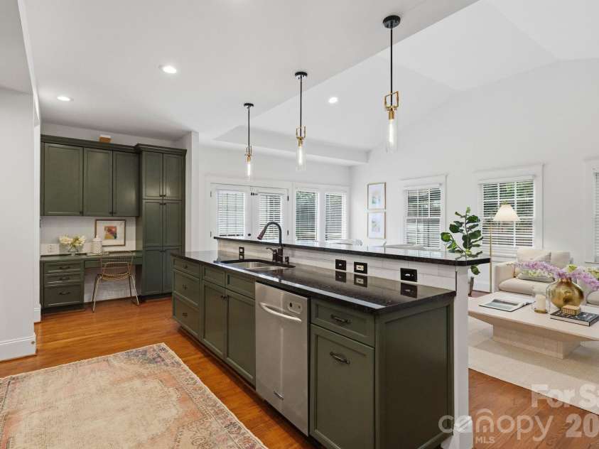 1815 DeArmon Drive, Charlotte, NC 28205.  MLS# CAR4421209, YatesRealty ID 49773. Built-in's on either side of kitchen