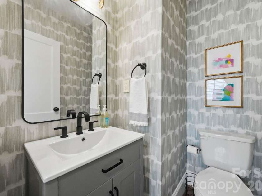 1815 DeArmon Drive, Charlotte, NC 28205.  MLS# CAR4421209, YatesRealty ID 49773. Custom wallpaper in powder room