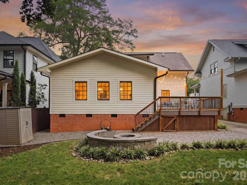 1815 DeArmon Drive, Charlotte, NC 28205.  MLS# CAR4421209, YatesRealty ID 49773. Deck, fire pit, grassy area for play!