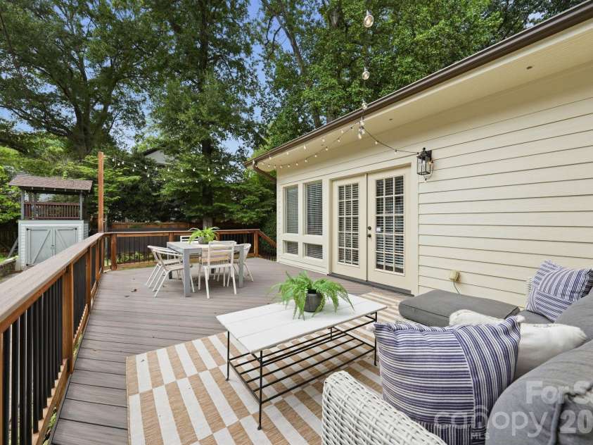 1815 DeArmon Drive, Charlotte, NC 28205.  MLS# CAR4421209, YatesRealty ID 49773. Expansive Trex deck with room for couch/seating and dining area!