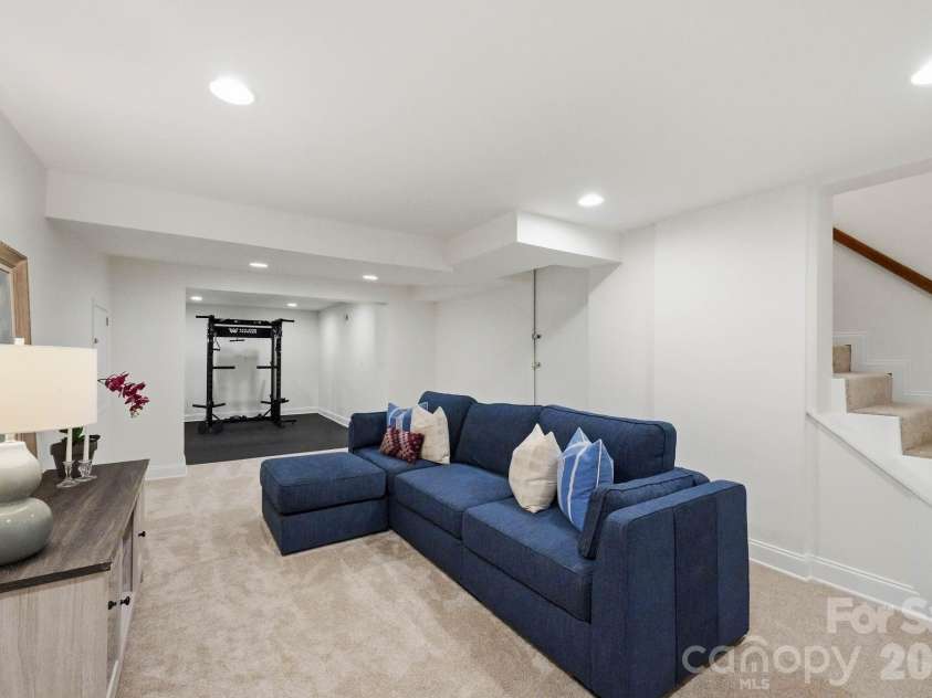 1815 DeArmon Drive, Charlotte, NC 28205.  MLS# CAR4421209, YatesRealty ID 49773. Fabulous bonus room/flex space in basement