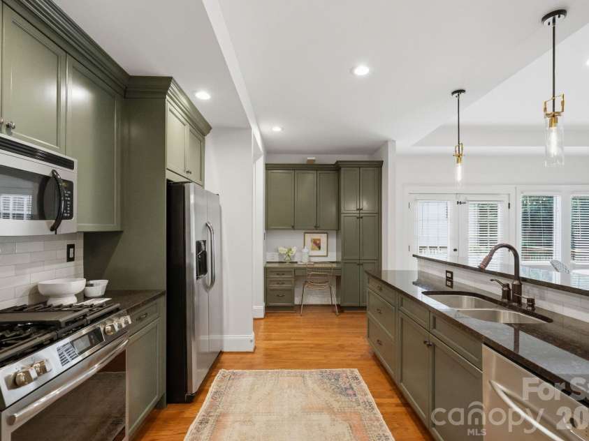 1815 DeArmon Drive, Charlotte, NC 28205.  MLS# CAR4421209, YatesRealty ID 49773. Open to living room and deck