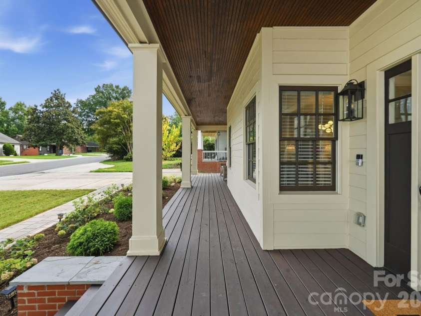 1815 DeArmon Drive, Charlotte, NC 28205.  MLS# CAR4421209, YatesRealty ID 49773. Rocking Chair front porch