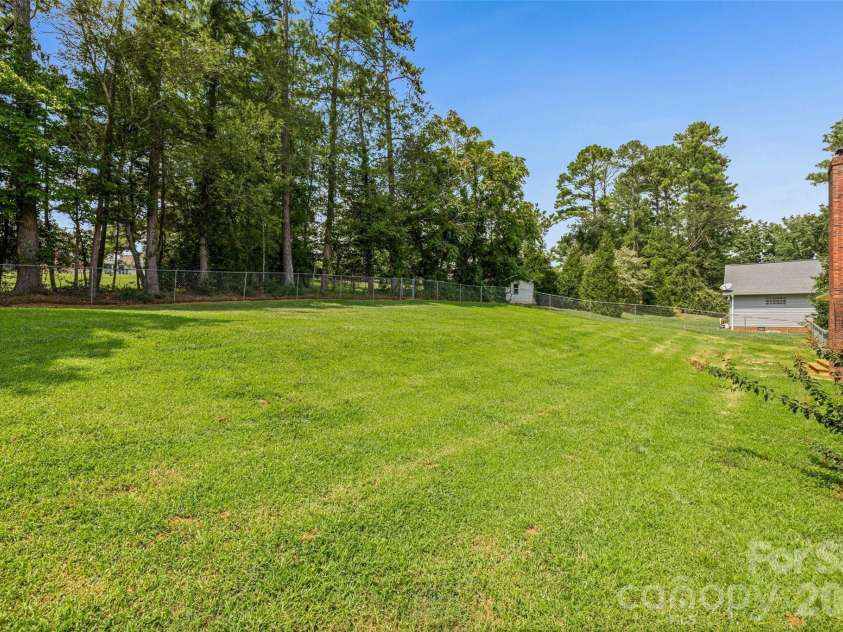 221 Nancy Drive, Shelby, NC 28152.  MLS# CAR4421218, YatesRealty ID 49775. Backing up to trees
