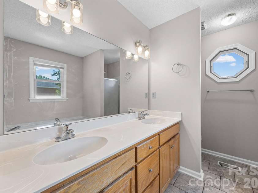 221 Nancy Drive, Shelby, NC 28152.  MLS# CAR4421218, YatesRealty ID 49775. Dual sink vanity