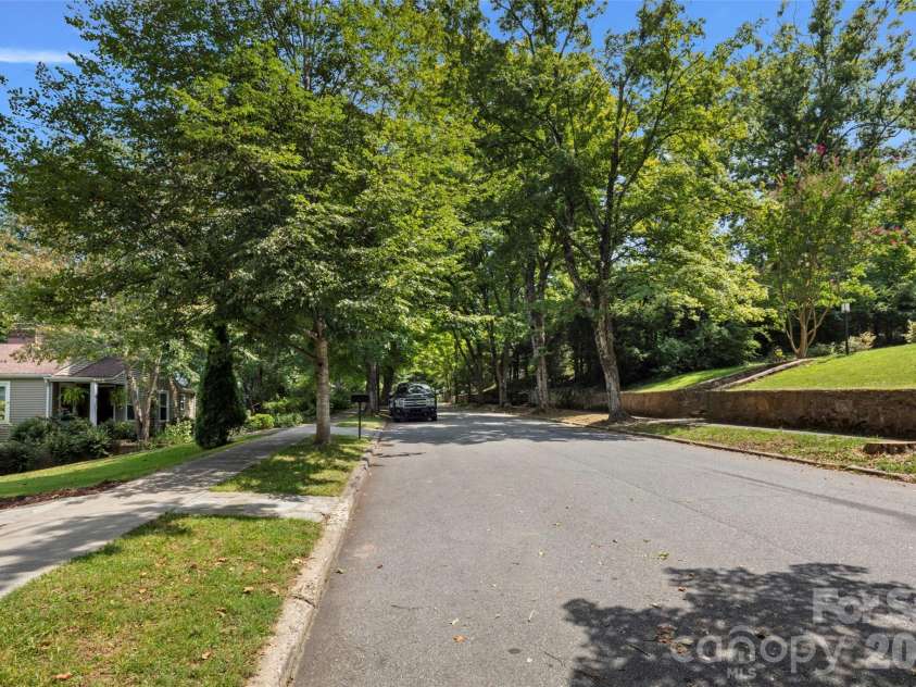 33 Maywood Road, Asheville, NC 28804.  MLS# CAR4420601, YatesRealty ID 49789. Dreamy tree lined street with sidewalks and burried utilites