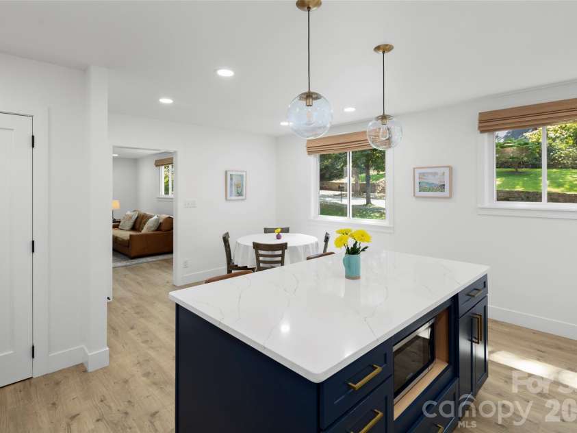 33 Maywood Road, Asheville, NC 28804.  MLS# CAR4420601, YatesRealty ID 49789. With windows looking out onto front yard