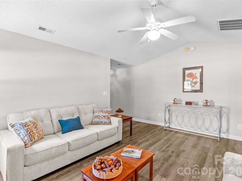 143 Ashwood Lane, Mooresville, NC 28117.  MLS# CAR4349646, YatesRealty ID 4979. Great sized living room