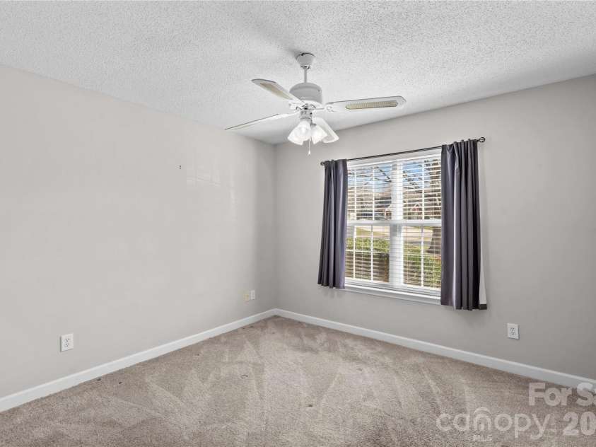 143 Ashwood Lane, Mooresville, NC 28117.  MLS# CAR4349646, YatesRealty ID 4979. Guest bedroom