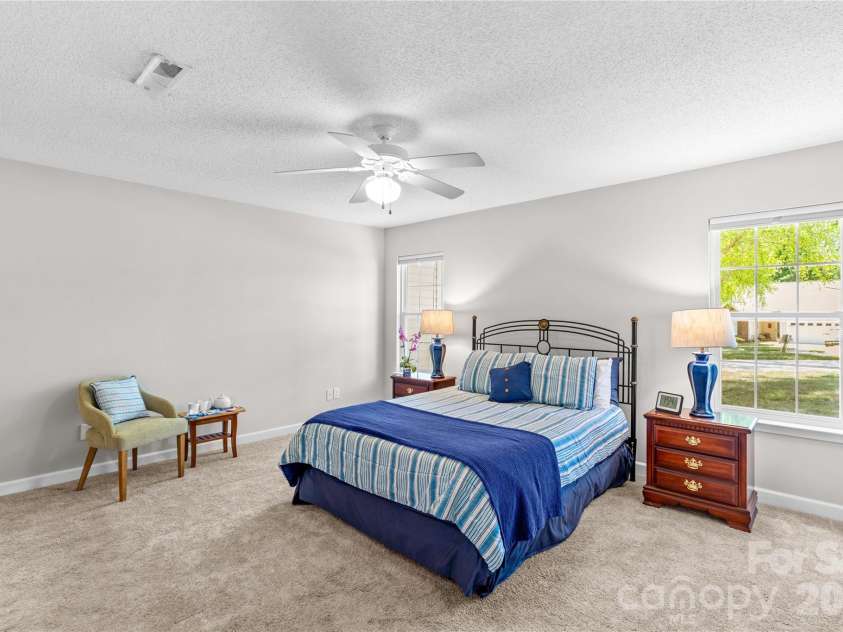 143 Ashwood Lane, Mooresville, NC 28117.  MLS# CAR4349646, YatesRealty ID 4979. Oversized primary bedroom