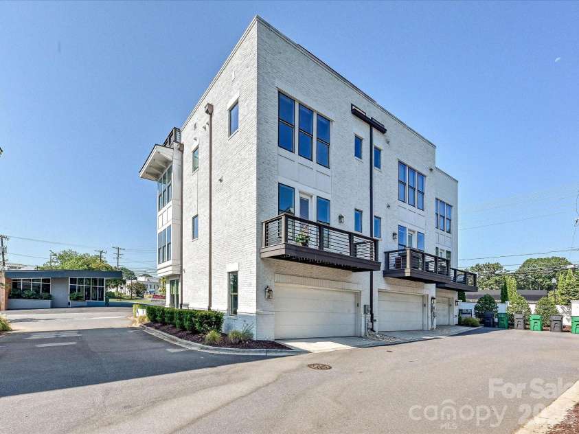 1107 Reece Road, Charlotte, NC 28209.  MLS# CAR4420570, YatesRealty ID 49793. Attached 2-car Garage w/ custom storage shelves