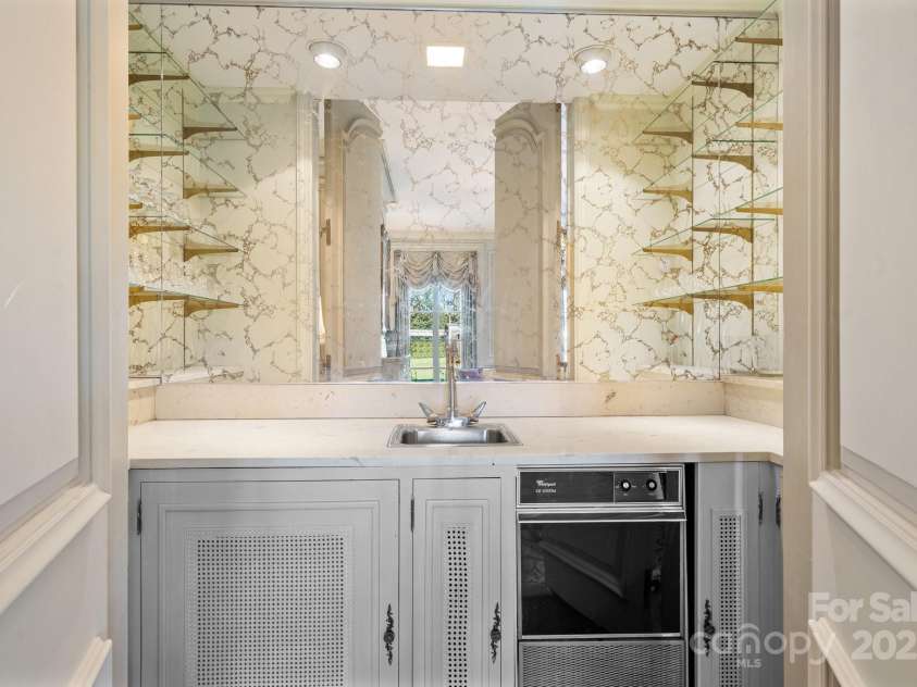 135 Claron Place, Lenoir, NC 28645.  MLS# CAR4213212, YatesRealty ID 498. Hidden Wet Bar w/Refrigerator, Ice Maker, Sink & Shelving