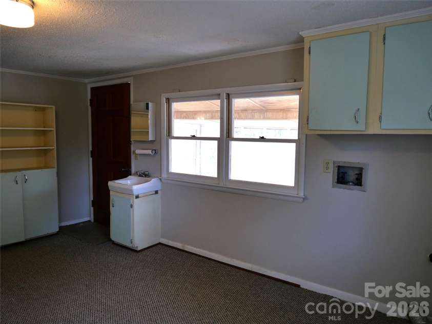 220 Russell Street, Troy, NC 27371.  MLS# CAR4357867, YatesRealty ID 4980. 