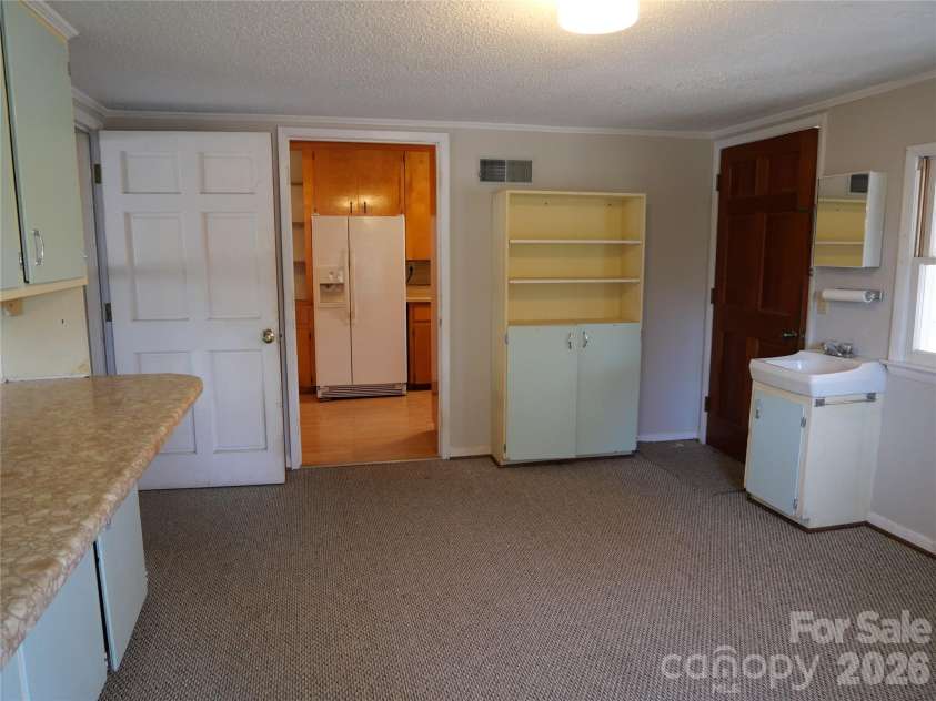 220 Russell Street, Troy, NC 27371.  MLS# CAR4357867, YatesRealty ID 4980. 