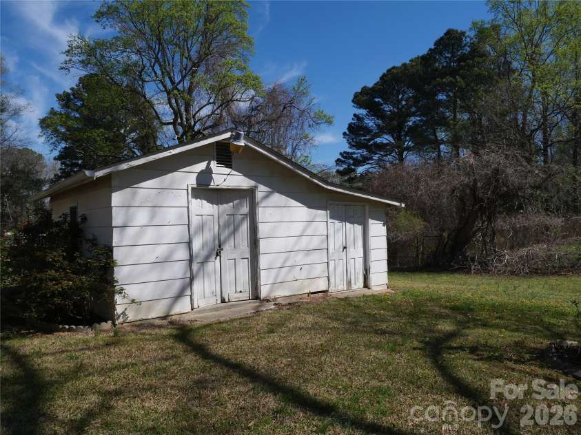 220 Russell Street, Troy, NC 27371.  MLS# CAR4357867, YatesRealty ID 4980. Exterior workshop. 
