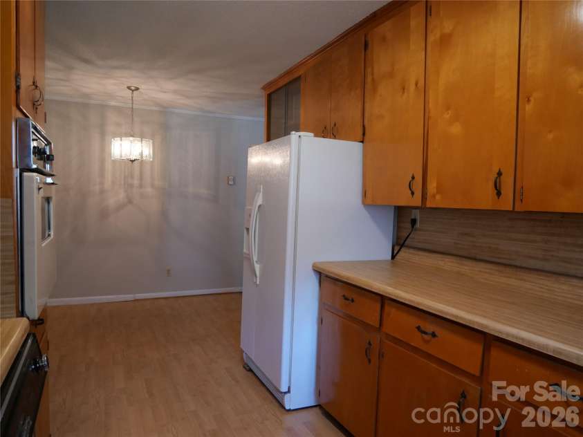 220 Russell Street, Troy, NC 27371.  MLS# CAR4357867, YatesRealty ID 4980. Kitchen with breakfast area. 