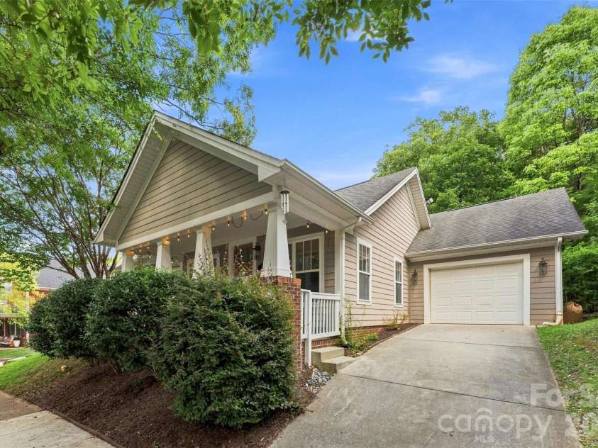 14100 Garden District Row, Huntersville, NC 28078.  MLS# CAR4420231, YatesRealty ID 49800. Attached garage and private driveway