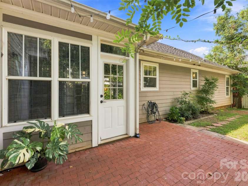 14100 Garden District Row, Huntersville, NC 28078.  MLS# CAR4420231, YatesRealty ID 49800. Brick Patio inside a fenced in back yard