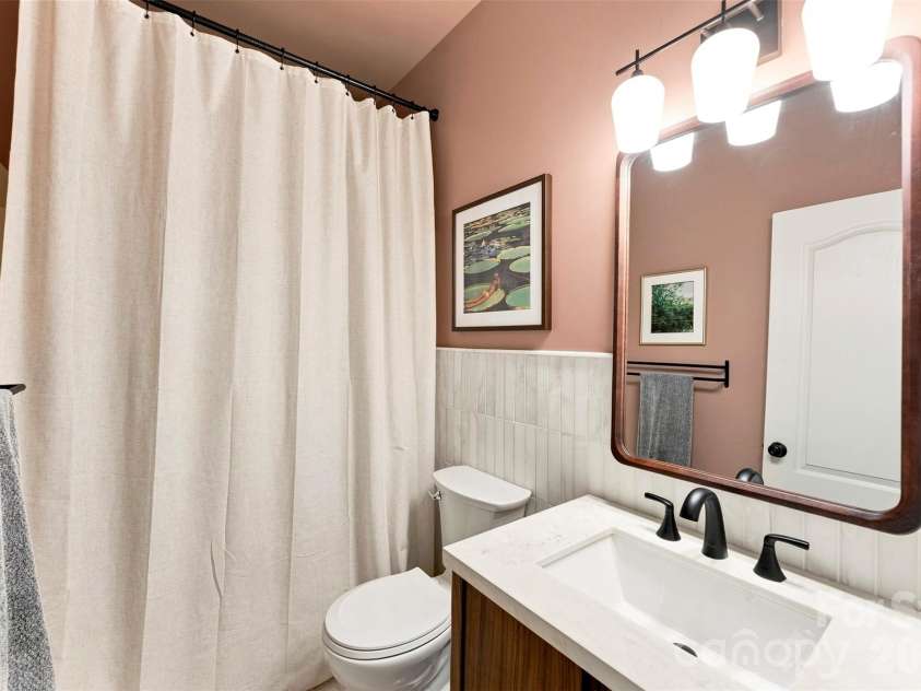 14100 Garden District Row, Huntersville, NC 28078.  MLS# CAR4420231, YatesRealty ID 49800. Hall bathroom