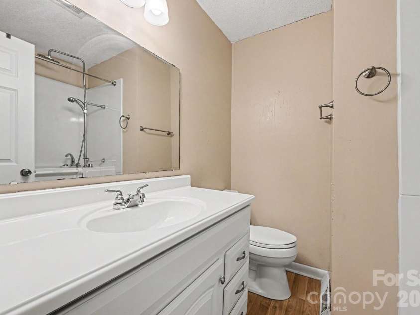 141 Howie Street, Mount Holly, NC 28120.  MLS# CAR4419633, YatesRealty ID 49803. Main Bathroom