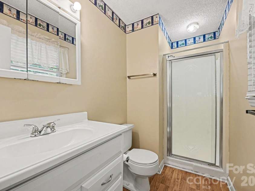 141 Howie Street, Mount Holly, NC 28120.  MLS# CAR4419633, YatesRealty ID 49803. Primary Bathroom