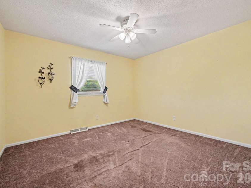 141 Howie Street, Mount Holly, NC 28120.  MLS# CAR4419633, YatesRealty ID 49803. Third Bedroom