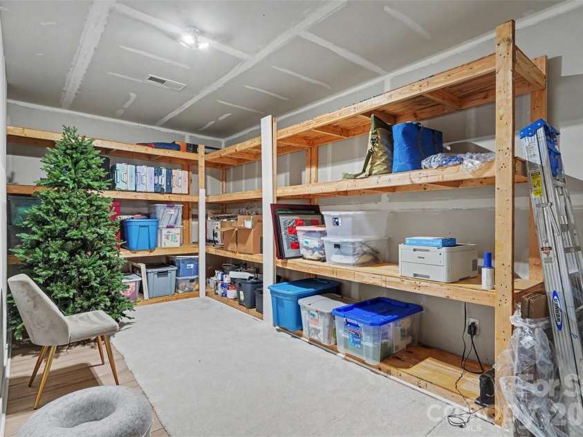 15304 Wyndham Oaks Drive, Charlotte, NC 28277.  MLS# CAR4419486, YatesRealty ID 49806. Walk-in Storage Room